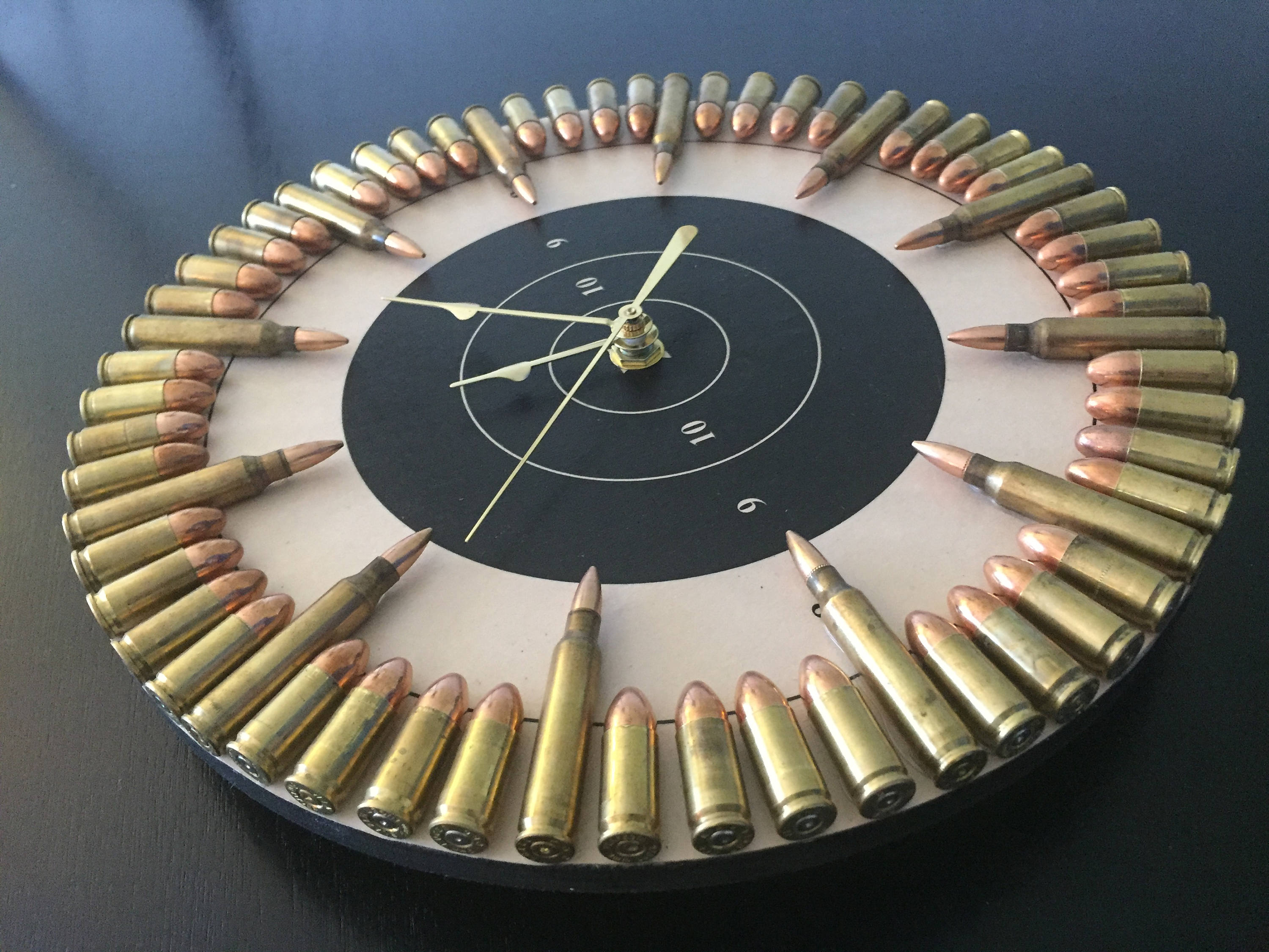 Bullet Clock on Target with Inert Ammo. Great gift for Etsy