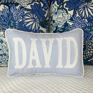 Boudoir Lumbar Name pillow(classic fishtail ) in light blue Pique base fabric,many more styles at www.edelweissembroidery.com