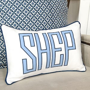 Boudoir Lumbar Name pillow(Benjamin font).White linen base fabric .Many more styles at www.edelweissembroidery.com