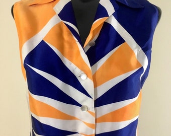 May include: A sleeveless button-up shirt with a geometric pattern in orange, white, and blue.