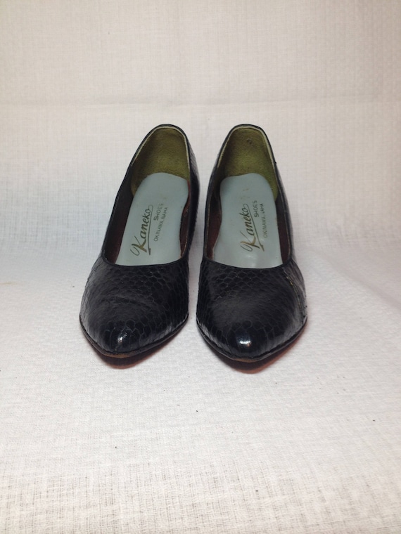 black snakeskin heels