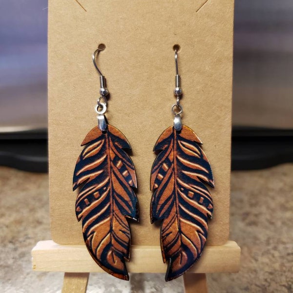 Brown tooled leather look feather dangle earrings