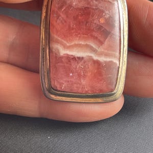 Rhodochrosite and Sterling Silver Pendant. The color of love, like the soft petals of a rose, the Rhodochrosite stone of self care