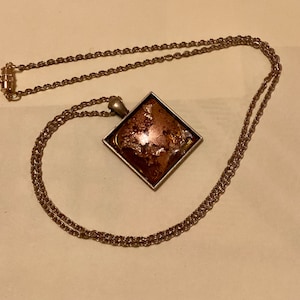 Gold lovers pendant