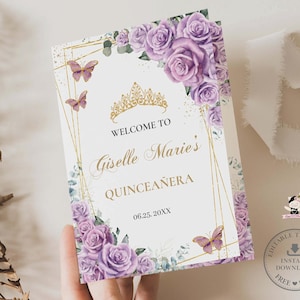 May include: Purple and gold Quinceañera welcome sign with a gold crown, butterflies, and floral designs. The text reads "Welcome to Giselle Marie's Quinceañera 06.25.20XX".