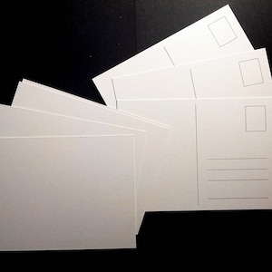 20 cartoline bianche davanti, a righe dietro