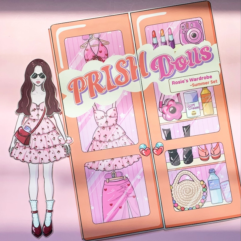 May include: A paper doll with a pink floral dress and sunglasses stands next to a wardrobe set. The wardrobe features clothing and accessories, including a swimsuit, dress, skirt, shoes, and a handbag. The set is labeled "PRISH Dolls" and "Rosie's Wardrobe - Summer Set."