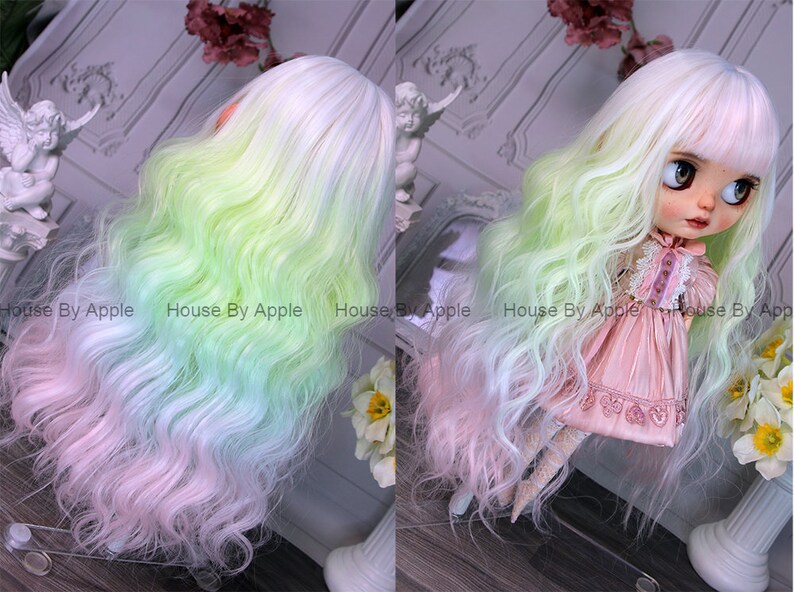 May include: A long, wavy doll wig with a gradient of white, light green, and pink. The wig is styled with a side part and bangs.