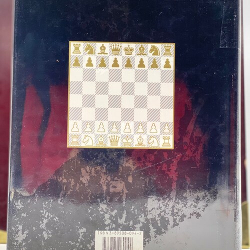 Chess: 5334 Problems, Combinations and Games. Lazlo shops Polgar