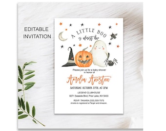 May include: A Halloween-themed baby shower invitation with a pumpkin wearing a witch's hat, a ghost, and a spider. The text reads "A Little Boo is almost due" and includes the name "Amelia Aniston".