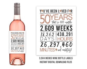 May include: A printable wine bottle label with a rose gold glitter design. The label says "You've been loved for 50 years, that is 600 months, 2,609 weeks, 18,262 days, 438,291 hours, 26,297,460 minutes and counting!" The label is 3.5 x 4 inches.