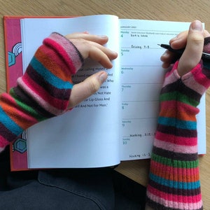 Cashmere 100% wrist and hand warmers. Hand made. Lots of variations.