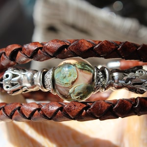 Handmade lampwork beads on 6mm leather cord with memory wire. stackable bracelet.