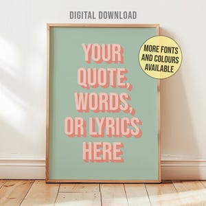 May include: A framed print with the text "YOUR QUOTE, WORDS, OR LYRICS HERE" in pink, 3D-style lettering on a light green background. The words "DIGITAL DOWNLOAD" are at the top. A yellow circle states "MORE FONTS AND COLOURS AVAILABLE".