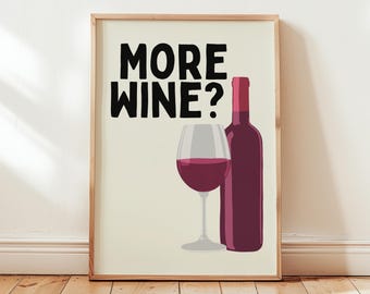 May include: A framed print with the text "MORE WINE?" in black lettering. A glass of red wine and a bottle of red wine are depicted below the text.