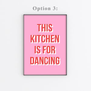 May include: Pink printable wall art with the text "This Kitchen is for Dancing" in red with a white outline.