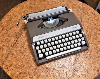 Royal Tab-O-Matic Portable typewriter , Japan vintage 1973 ultra portable typewriter, brown  color typewriter with hard plastic case
