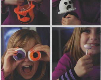 Knitting Patterns for Six Halloween Gifts Cat Ears, Eye Balls Ghost Spider Head Wristband Treat Bag: Pages from Simply Knitting Magazine.