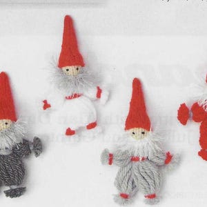May include: Four handmade gnome figurines with red pointed hats, white beards, and various colored outfits. The gnomes are made of yarn and have small, detailed features, perfect for holiday decor.