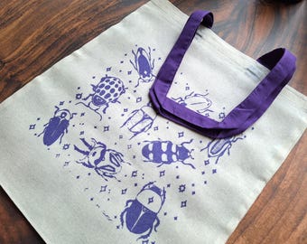 Beetle tote | 100% cotton totebag in black or purple