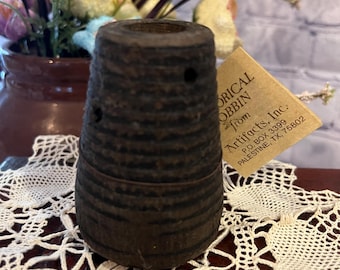 Antieke spoelspoel van textiel: houten spoel