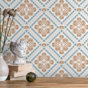 May include: A white background with a repeating pattern of brown and blue geometric shapes. The pattern is reminiscent of a traditional tile design. A vase with dried flowers, a bust of a woman, and a glass orb are in the foreground.