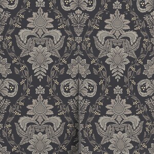 May include: Black wallpaper with a repeating pattern of gold and gray floral damask designs. The wallpaper is rolled up and partially unrolled, showing the pattern.