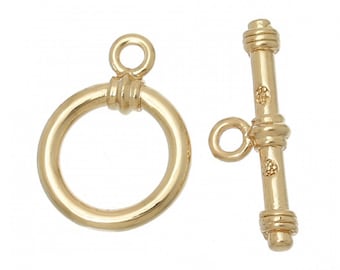 1 gold-plated round toggle clasp