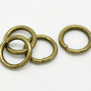 50 rings 8 mm thick round open antique bronze metal