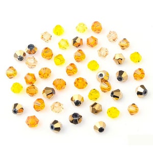 Transparent Iridescent Orange Crystal Spinning Top Beads 3.5