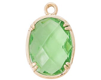 1 pendentif ovale 17 mm strass vert à facettes et serti griffes doré