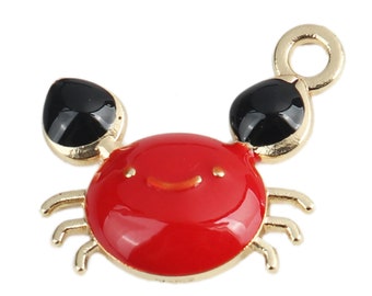 1 pendentif crabe marin métal doré émail rouge et noire