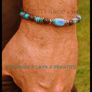 May include: A turquoise, lava, and hematite beaded bracelet. The bracelet features a large, rectangular turquoise bead, surrounded by smaller turquoise, black lava, and silver-toned beads. The text "MELYS MAGIC 4 MEN" and "TURQUOISE & LAVA & HEMATITE" are visible.