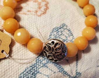Peach Candy Jade Bracelet with Silver Filigree Bead
