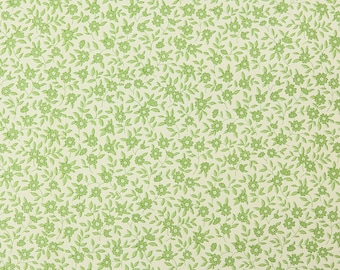 May include: A seamless pattern of small green flowers and leaves on a cream background.