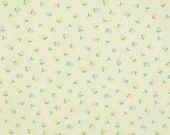 May include: A seamless pattern wallpaper with a repeating design of small green stems with clusters of blue, red, and yellow dots. The background is a light cream color.