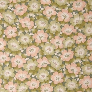May include: A vintage floral wallpaper pattern with pink and green flowers on a dark green background.