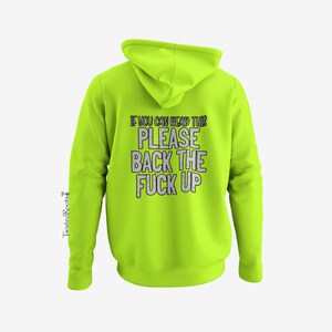 A bright yellow hoodie with a message printed on the back.