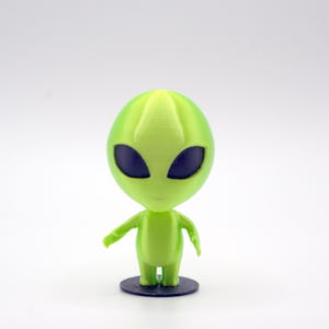 Green Alien Figurine - Cute UFO Extraterrestrial Decor for Area 51 and Outer Space Lovers
