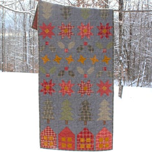 Hemspunnet julquiltmönster PDF av Jen Daly Quilts