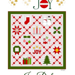 May include: A Christmas-themed quilt with a white background and a grid of red and green squares. The quilt features festive images like a stocking, snowman, and Christmas tree. The words "Comfort & JOY" are at the top.