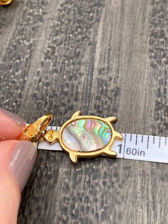 Vintage gold tone metal and abalone shell clip-on… - image 9