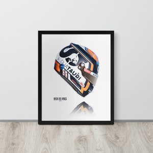 May include: A white, orange and blue Formula 1 racing helmet with the AlphaTauri logo and the driver's name, Nyck de Vries, printed on it.