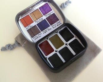 HOLBEIN Japan Granulating Moon Set of 2025 New Colors with 6 Nature Lunar Themed Mini Pans in Miniature Tin with Travel Carrying Pouch