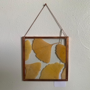 May include: A set of three ceramic mugs with a speckled, matte finish. The mugs are in shades of cream, light gray, and dark gray. Each mug has a simple, minimalist design, perfect for coffee or tea.