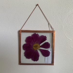 May include: A set of three ceramic mugs with a speckled, matte finish. The mugs are in shades of cream, light gray, and dark gray. Each mug has a simple, minimalist design, perfect for coffee or tea.