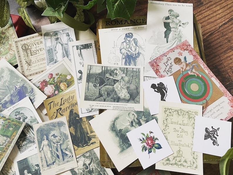 May include: A collection of vintage-style cards and illustrations, featuring romantic themes. The cards display images of couples, cherubs, and floral designs, with text such as "Quiver of Love" and "Love's Target". The color palette includes shades of cream, sepia, and touches of red.