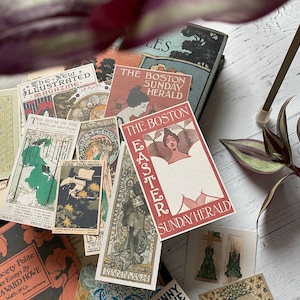 May include: A collection of vintage ephemera, including postcards and magazine covers, with a focus on art nouveau designs. The color palette includes shades of red, green, and beige. Several pieces feature text, such as "The Boston Sunday Herald" and "The New Illustrated Magazine."