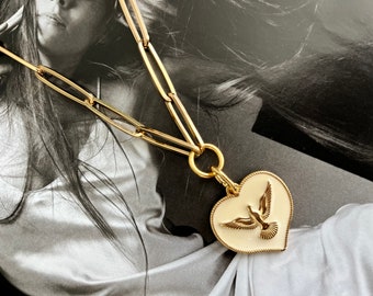 Thick and Rustic Gold choker with Holy Spirit charm.Gifts for her with a variety of designs you’ll love. Explore now!