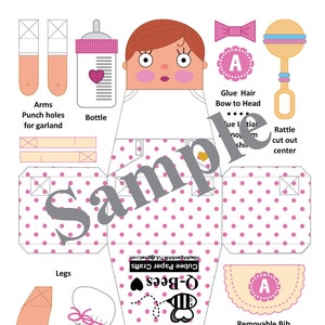 May include: A printable paper craft doll template for a baby girl. The doll is wearing a pink and white polka dot dress and a bib. The template includes instructions for assembling the doll and adding details like hair, a rattle, and a bottle.